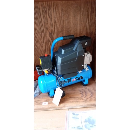 61 - Wolf little cub 1.5 horsepower 116 PSI compressor brand new with accessories