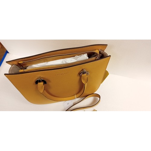 70 - Light mustard handbag with 2 shoulder straps as new. Although we have no provenance this handbag cam... 