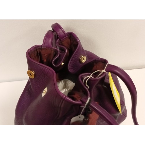 73 - OKPTA purple handbag looks unused.  Although we have no provenance this handbag came from an avid co... 