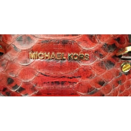 76 - Believed to be Michael Kors python skin selma red hand bag.  Although we have no provenance this han... 