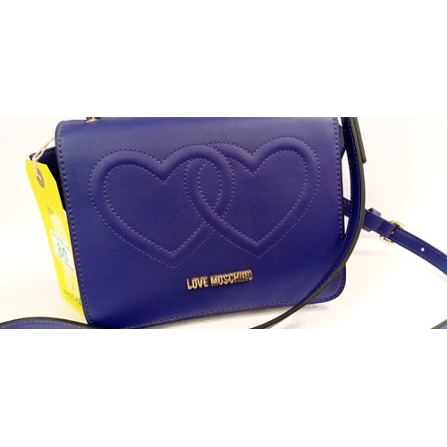 80 - Love Moschino cross body handbag in purple unused. Although we have no provenance this handbag came ... 