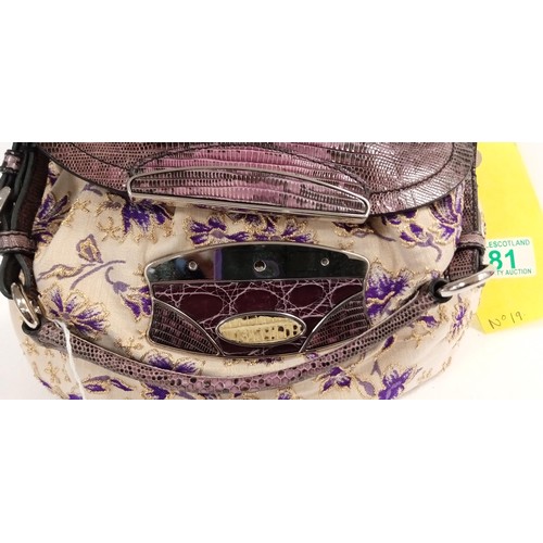 81 - Believed to be Prada purple, Cream & gold hand bag looks unused.  Although we have no provenance thi... 