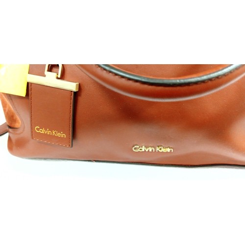 82 - Believed to be Calvin Klein two-tone brown shoulder bag unused.  Although we have no provenance this... 