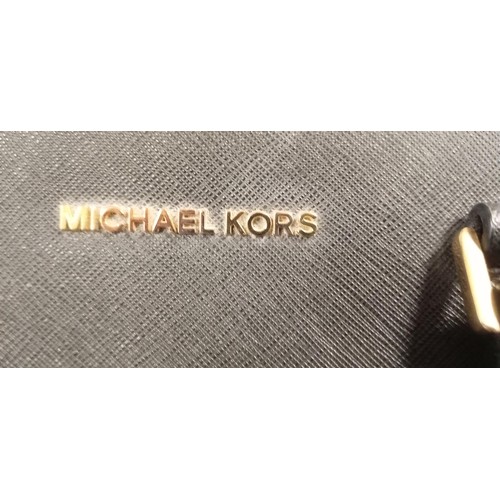 86 - Michael Kors handbag black.  Although we have no provenance this handbag came from an avid collector