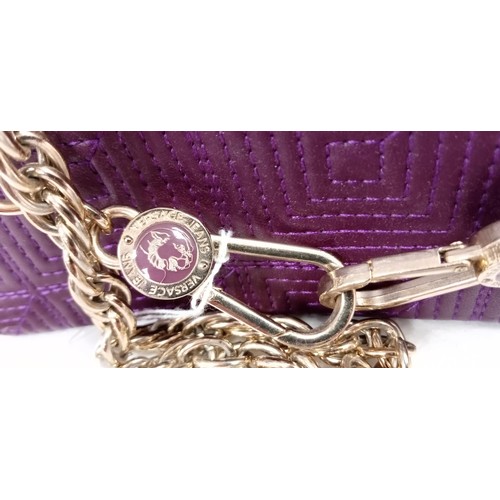 88 - Believed to be Versace Jeans purple shoulder hand bag.  Although we have no provenance this handbag ... 