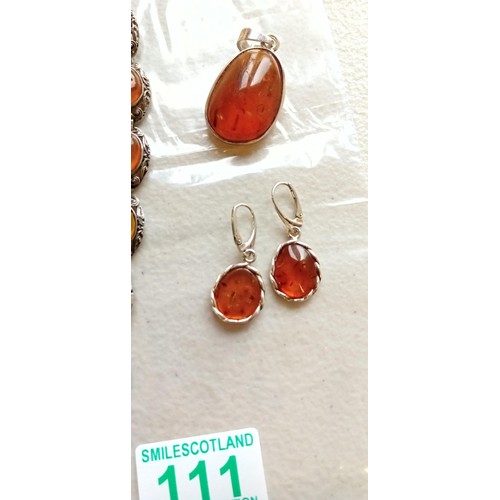 111 - Selection of mainly silver jewellery inc. amber bracelet, pendant and earrings