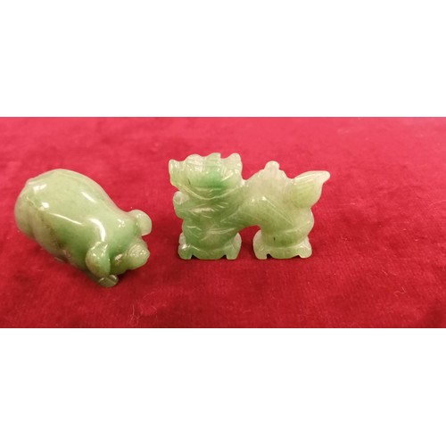 118 - 2x Small jade figurines pig & dragon