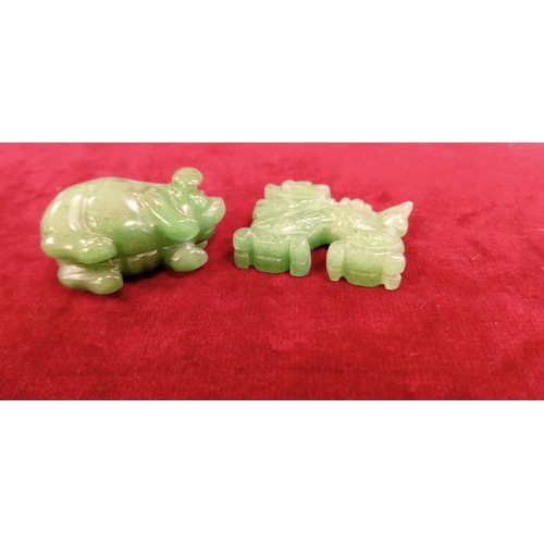 118 - 2x Small jade figurines pig & dragon