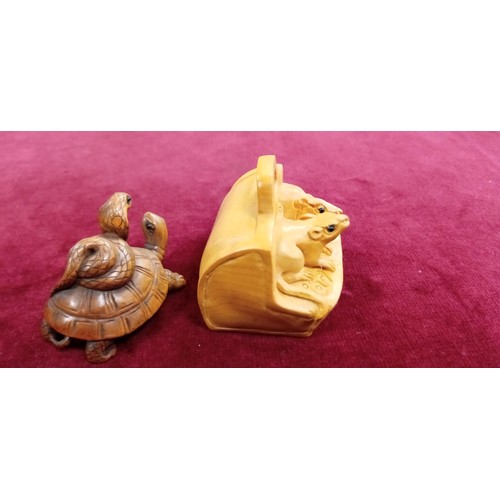 121 - 2x Netsukes (button fasteners) signed inc. tortoise with a snake & mouse/ rat family in a case