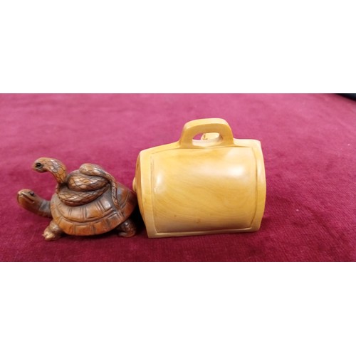 121 - 2x Netsukes (button fasteners) signed inc. tortoise with a snake & mouse/ rat family in a case