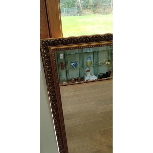 176 - Modern bevelled glass framed mirror 87x112cm approx.