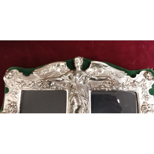 102A - Marked sterling silver double picture framed winged angel and cherubs