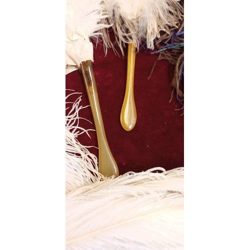 57 - Large selection of vintage hide yourself feathers