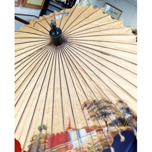 337 - Vintage parasol made in Bassein Bhurma marked 'upovin. gold medalist' with silver handle