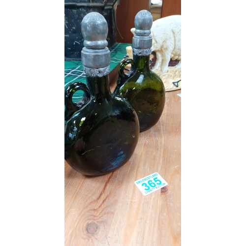 365 - Pair of vintage green glass bottles with pewter tops