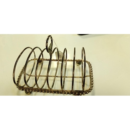 120 - Sterling silver hallmarked believed London toast rack early silver weighs 280g approx