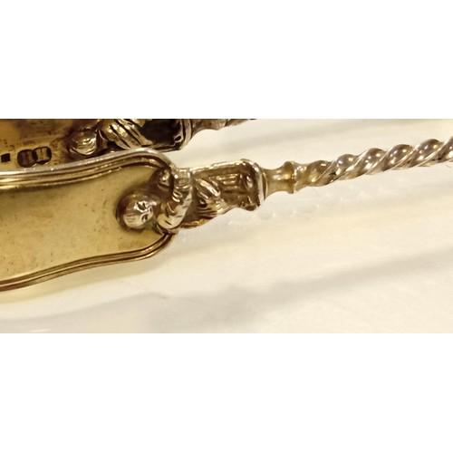 121 - Circa 1865 sterling silver hallmarked believed London ornate sugar tongues weighs 29g approx