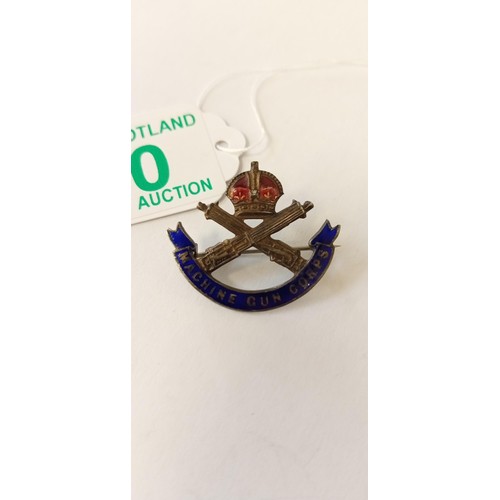 20 - Machine Gun Corps silver and enamel lapel badge