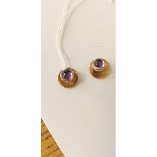 78 - Pair of 14ct gold and amethyst collar studs 2.56g approx.