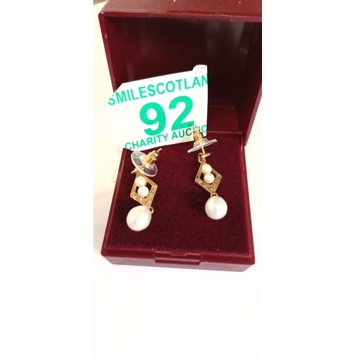 92 - 9ct gold & pearl pair of earrings fully hallmarked