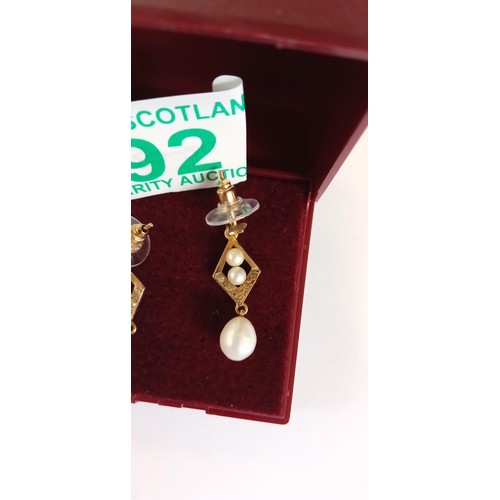 92 - 9ct gold & pearl pair of earrings fully hallmarked