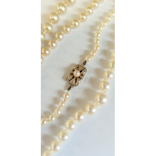 96 - 2 sets of pearl necklaces with 9ct gold clasps