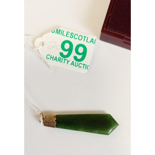 99 - Unmarked but believed gold topped green jade pendant