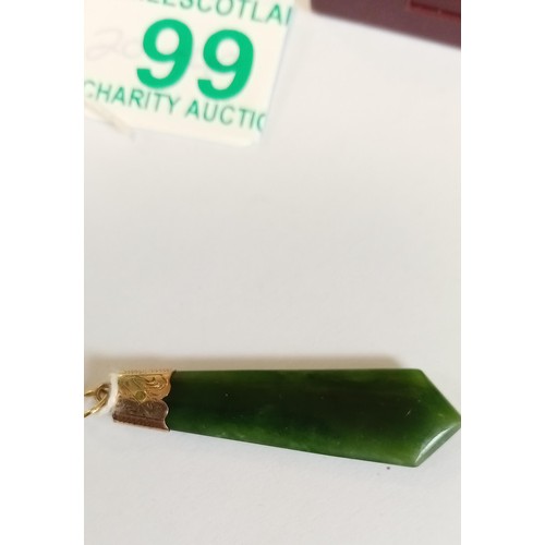 99 - Unmarked but believed gold topped green jade pendant