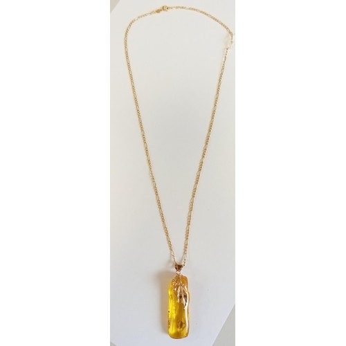 101 - 9ct gold & amber necklace