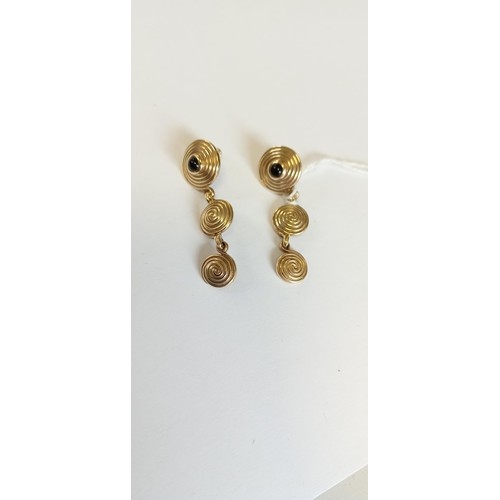 107 - Ola Gorie (OMG) bespoke 9ct gold pair of earrings with central onyx stone 7.7g approx. ex. weight of... 