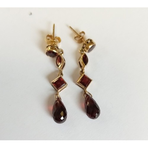 125 - 9ct gold fully hallmarked pair of earrings with stones (possibly garnet)