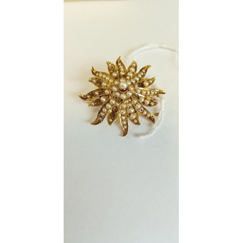 129 - 14ct gold and graduated seed pearl brooch/ pendant 8.9g approx. A/F some pearls are in the box