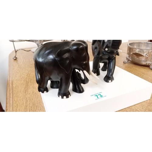 73 - Pair of antique wooden elephants A/F