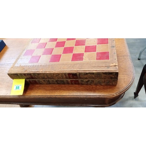 88 - Parlour Games: Chess board/ Games Box in the form of two book volumes.  Backgammon board inside with... 