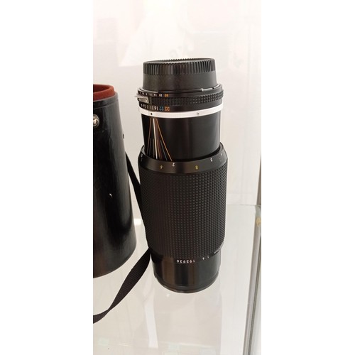 120 - Nikkor 80-200mm lens 1:4 no 193936 with UV filter and black carry case