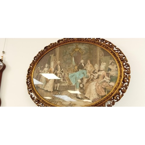 215 - Pair of oval gilt and plaster framed etchings with hand touched painted colour