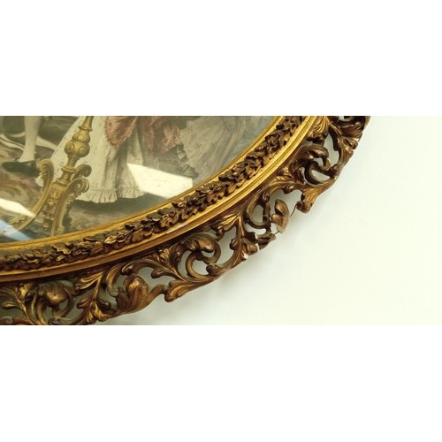 215 - Pair of oval gilt and plaster framed etchings with hand touched painted colour