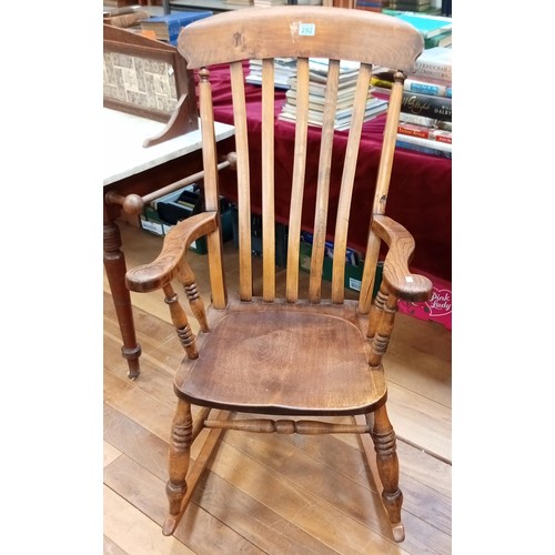 292 - Vintage solid wood rocking chair