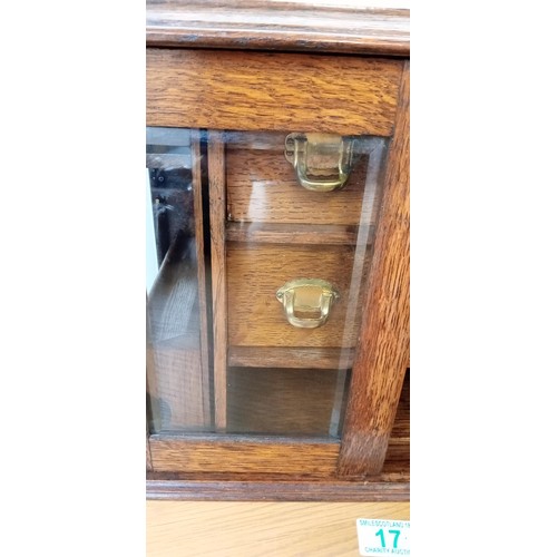 17 - Oak smokers cabinet with removable pipe rack, copper and brass tobacco jar