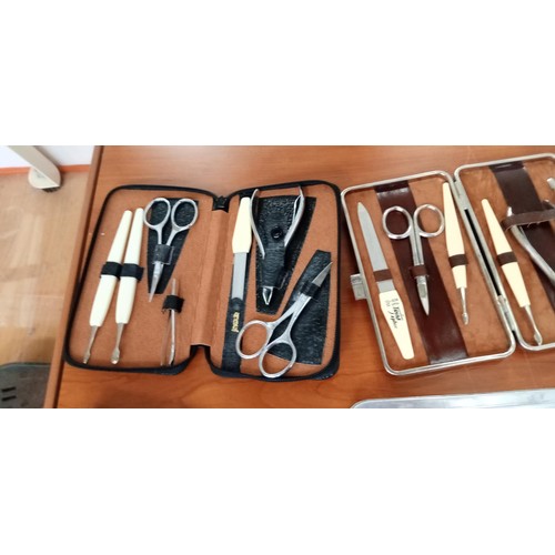 112 - Vintage razors and sharpeners, plus manicure sets