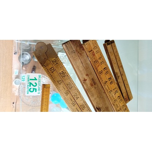 125 - 5 Vintage wooden folding rulers 2 include a ruler square