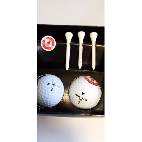 11 - Manchester United golf balls and tee plus Ingersoll pocket watch with chain