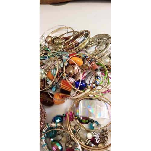 35 - Large selection of mainly fashion bangles & bracelets