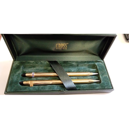 62 - 2 Cross pencils in a case with advertising symbols on, 1 has been engraved