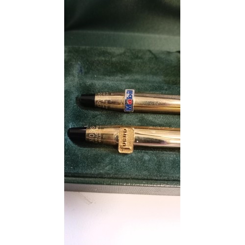 62 - 2 Cross pencils in a case with advertising symbols on, 1 has been engraved