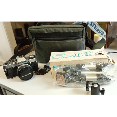 86 - Olympus OM20 camera made in Japan 1198278 in original case plus Slik tripod