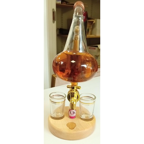 129 - Miniature glass whisky still with 2 dram glasses