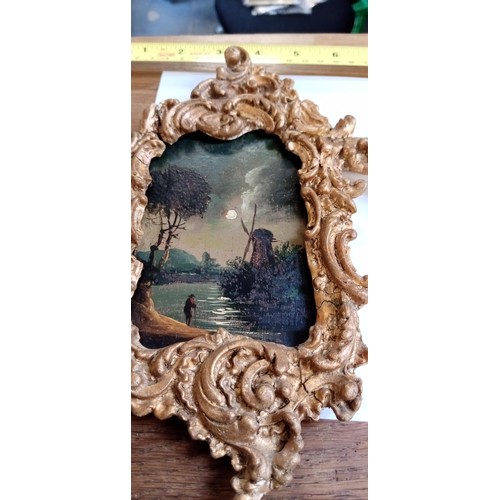 105 - Pair of possible early 20th Century Night time Dutch scenes in ornate matching picture frames