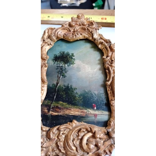 105 - Pair of possible early 20th Century Night time Dutch scenes in ornate matching picture frames