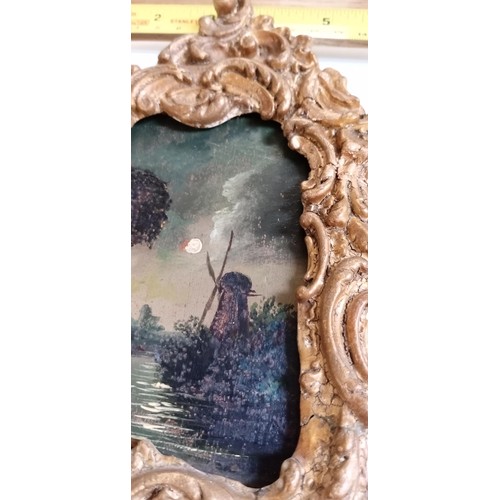 105 - Pair of possible early 20th Century Night time Dutch scenes in ornate matching picture frames